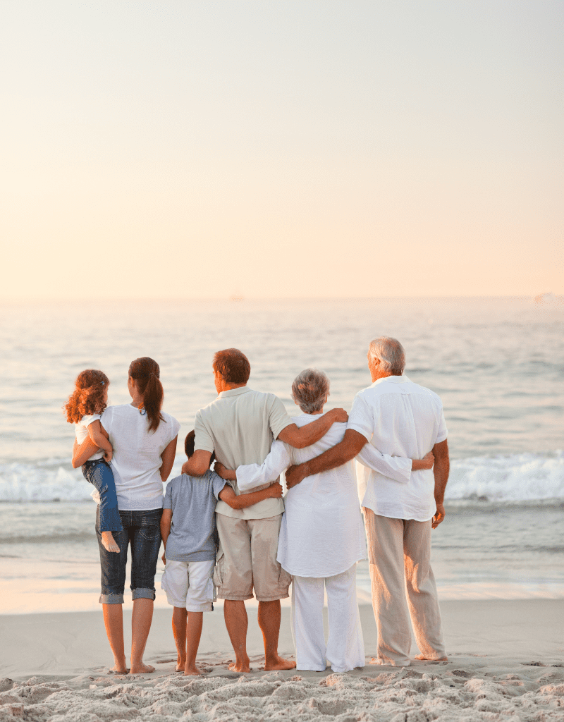 stock image family at the beach